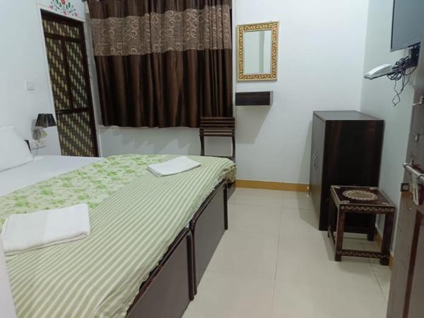 The Royal Lake View Villa : photo 5 de la chambre chambre double deluxe (2 adultes + 1 enfant)