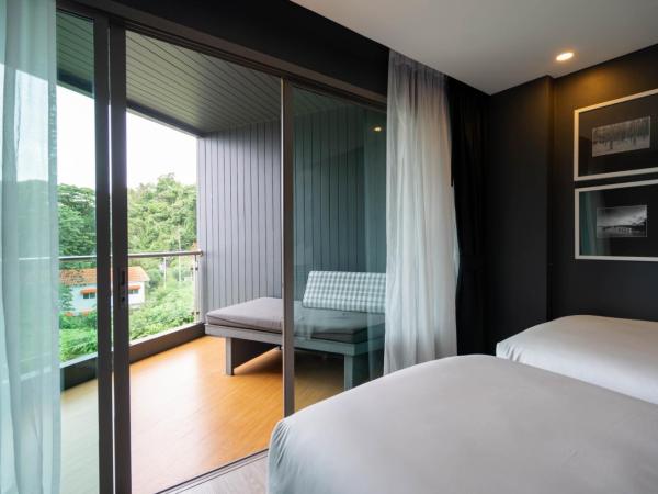 Foto Hotel Phuket Beachfront : photo 3 de la chambre hébergement lits jumeaux ozone hall avec balcon