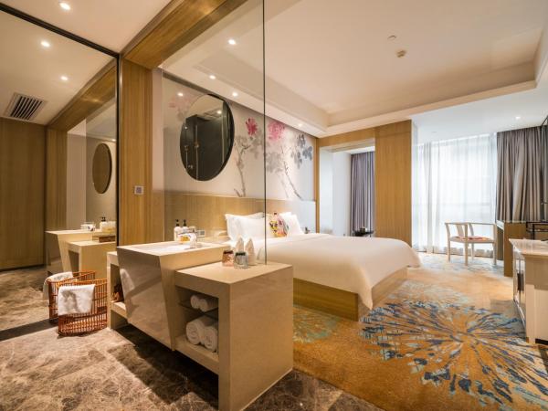 Paco Hotel Tаojin Metro Guangzhou-Free Shuttle Bus For Canton Fair : photo 2 de la chambre chambre lit king-size deluxe