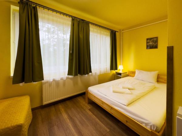 Írisz Panzió : photo 10 de la chambre chambre familiale