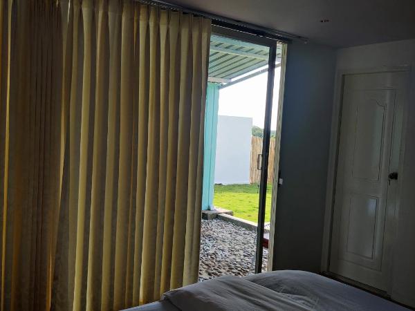 Clapping Leaves Resort : photo 3 de la chambre chambre quadruple - vue sur jardin