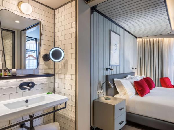 Canopy by Hilton Madrid Castellana : photo 4 de la chambre chambre d'angle premium lit king-size