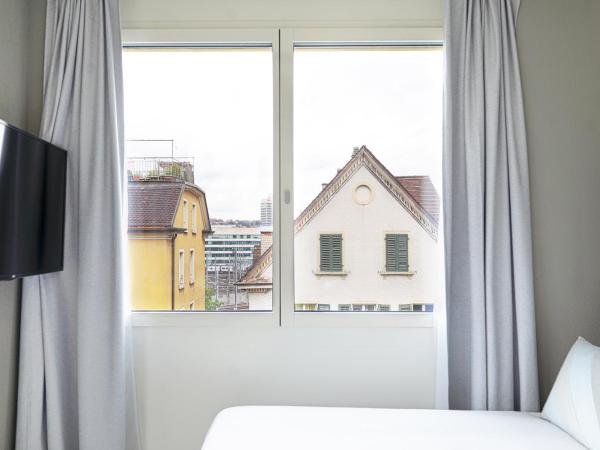 numa I Turi Apartments : photo 3 de la chambre large studio with kitchenette