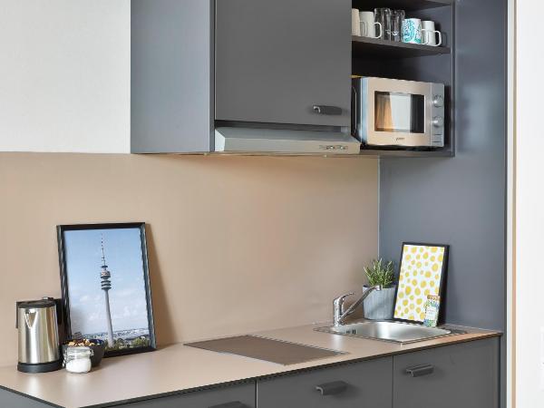 Living Hotel am Olympiapark : photo 3 de la chambre appartement double deluxe - long séjour