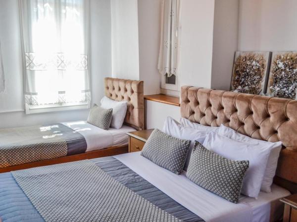 Bozzali Deluxe Hotel : photo 7 de la chambre chambre triple Économique