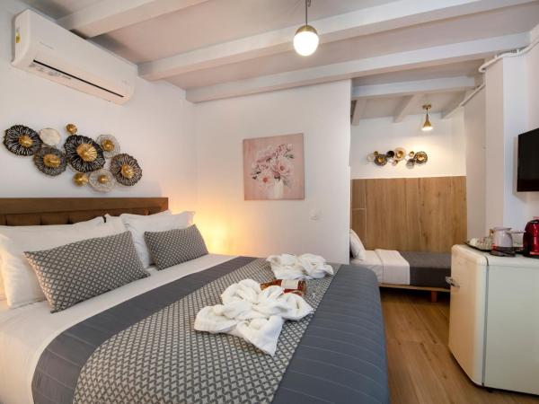 Bozzali Deluxe Hotel : photo 7 de la chambre chambre triple Économique