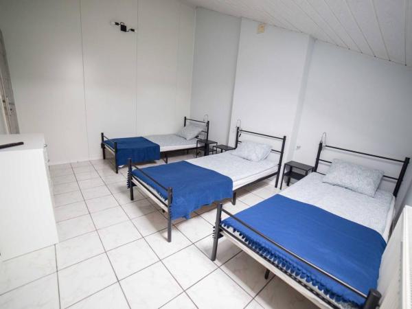 Pokoje Jaśminowa : photo 1 de la chambre chambre quadruple avec salle de bains commune