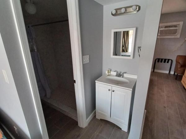 Palmsbythebeach : photo 7 de la chambre chambre triple confort avec douche