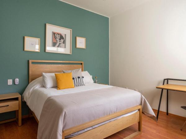 Casa Lucia : photo 5 de la chambre chambre deluxe avec 2 lits queen-size