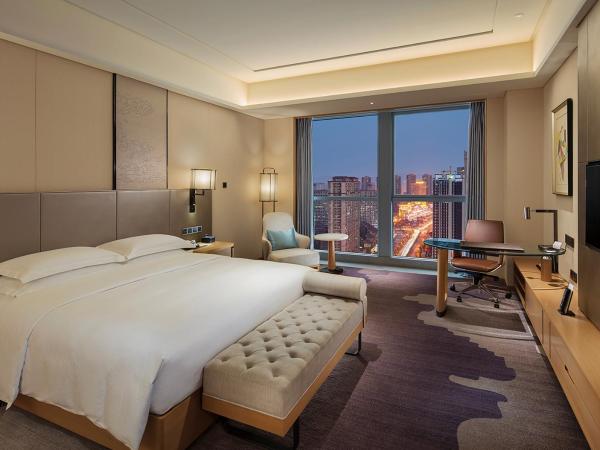 Doubletree By Hilton Chengdu Longquanyi : photo 2 de la chambre chambre lit king-size deluxe - Étage