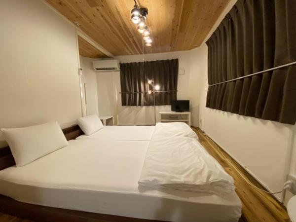 コインズホステル天神ペット宿泊可 : photo 1 de la chambre chambre lits jumeaux supérieure