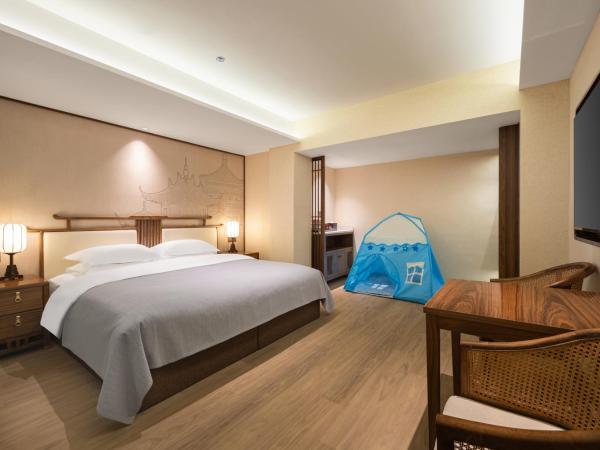 Honglu Garden Hotel Xi'an Bell and Drum Tower Huimin Street Store : photo 1 de la chambre yuechang'an · theme movie viewing parent child room