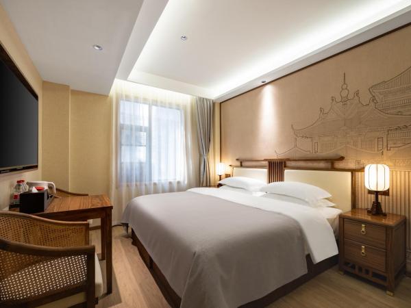 Honglu Garden Hotel Xi'an Bell and Drum Tower Huimin Street Store : photo 1 de la chambre recalling chang'an, quiet big bed room