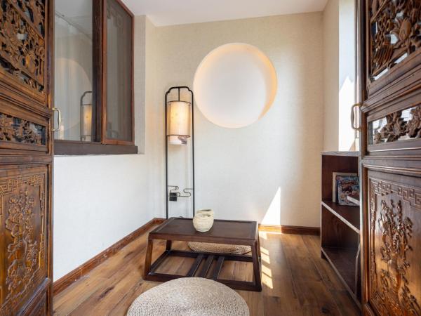 Honglu Garden Hotel Xi'an Bell and Drum Tower Huimin Street Store : photo 4 de la chambre yueman chang'an private courtyard suite