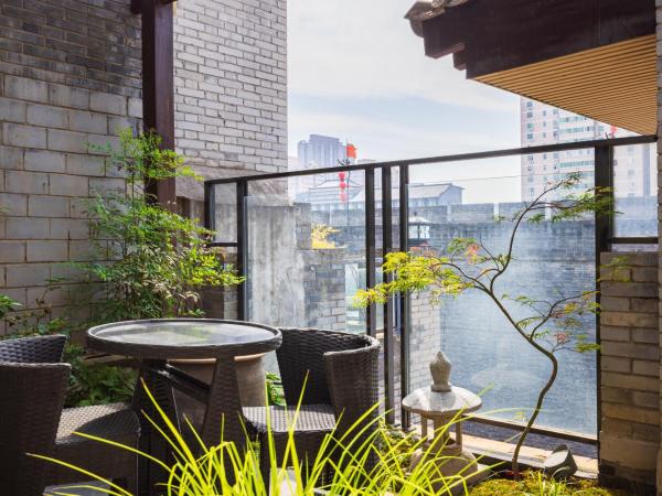Honglu Garden Hotel Xi'an Bell and Drum Tower Huimin Street Store : photo 4 de la chambre chang'an residence · city wall panoramic garden suite