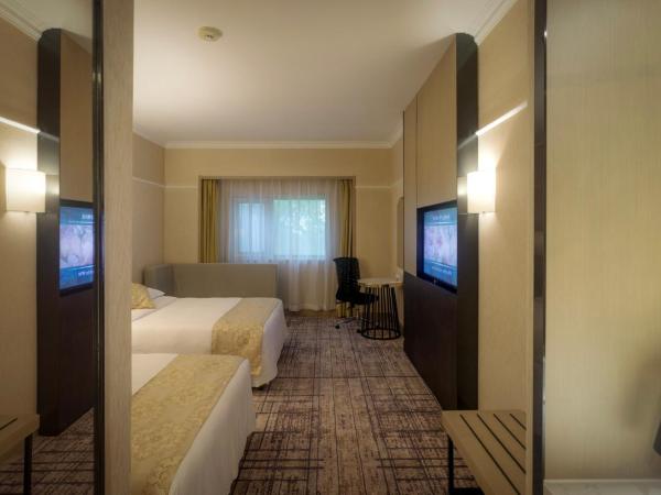 Metropark Lido Hotel Beijing : photo 2 de la chambre standard double room with two double beds and garden view