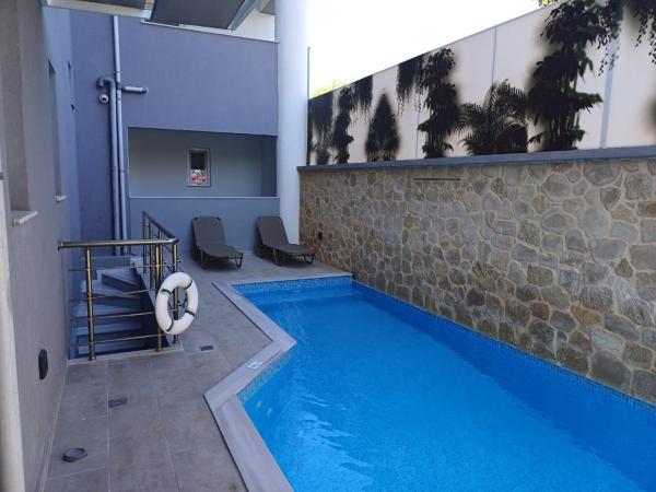 Deluxe City Hotel : photo 1 de la chambre chambre triple