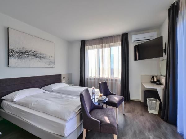 Hotel Luna Garni : photo 2 de la chambre chambre double ou lits jumeaux supérieure