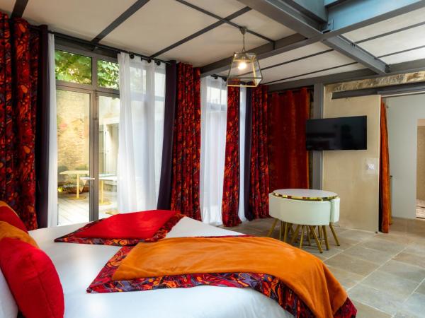 Le Clos Violette et Le 11 D'Aglaé - Appart' hôtel Design de Luxe : photo 3 de la chambre appartement deluxe
