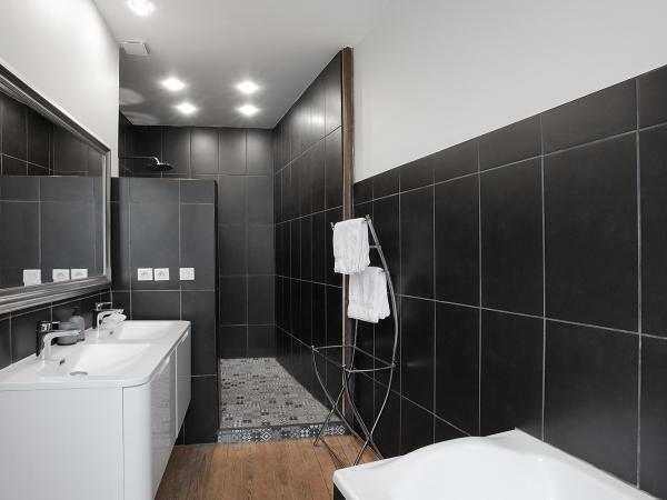 La Salamandre : photo 4 de la chambre suite junior - vue sur jardin