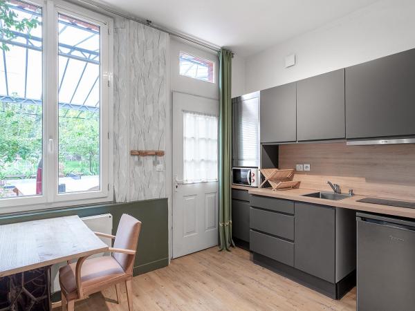 La Salamandre : photo 5 de la chambre appartement - vue sur jardin