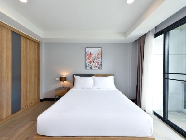 Raweewan Residence hotel : photo 1 de la chambre chambre lit queen-size - vue sur jardin