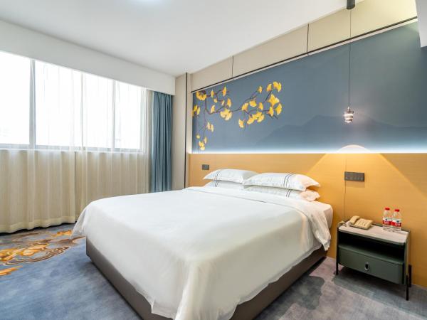 WAIFIDEN Hotel -Former Tokai Hotel - Xiaobei Metro Station - Free shuttle bus during Canton Fair : photo 2 de la chambre chambre supérieure lit queen-size