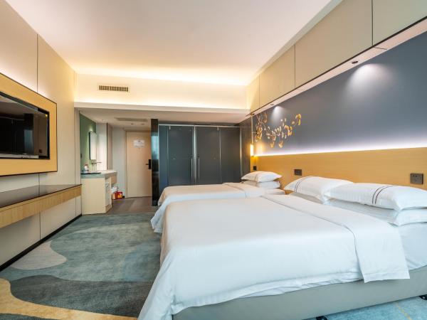 WAIFIDEN Hotel -Former Tokai Hotel - Xiaobei Metro Station - Free shuttle bus during Canton Fair : photo 8 de la chambre chambre lits jumeaux supérieure