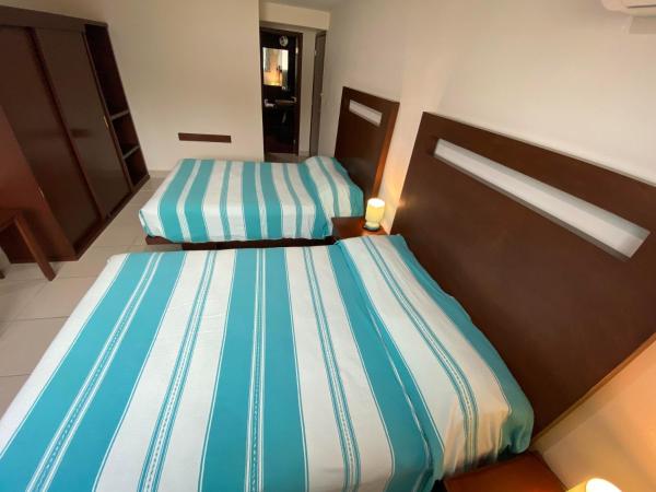 CORDIALITY INN : photo 3 de la chambre chambre lits jumeaux spacieuse