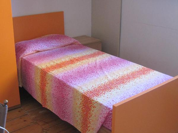 Ostello AMDG : photo 1 de la chambre lit simple dans dortoir pour hommes