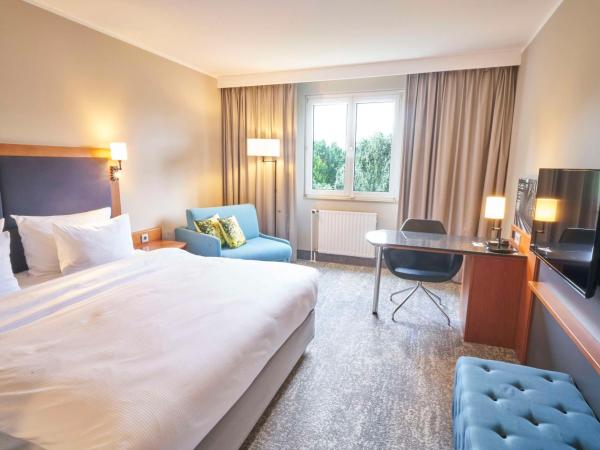 Radisson Blu Hotel Dortmund : photo 1 de la chambre chambre supérieure - vue sur parc