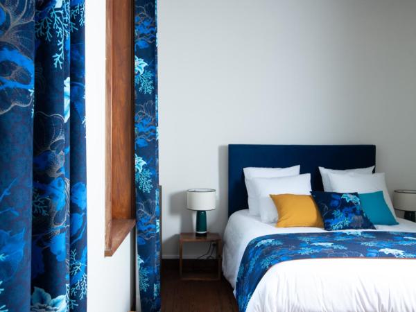 Villa Eliane - parking privé : photo 2 de la chambre chambre double deluxe avec baignoire