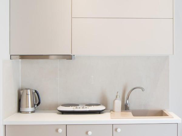 Calmare suites : photo 2 de la chambre suite deluxe avec lit king-size