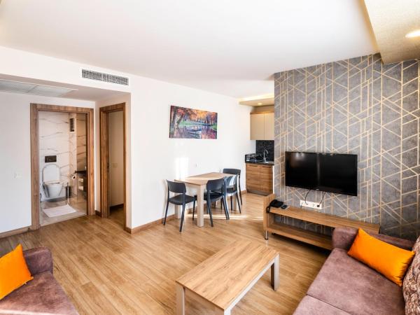 Golden World Suite Hotel : photo 2 de la chambre appartement standard