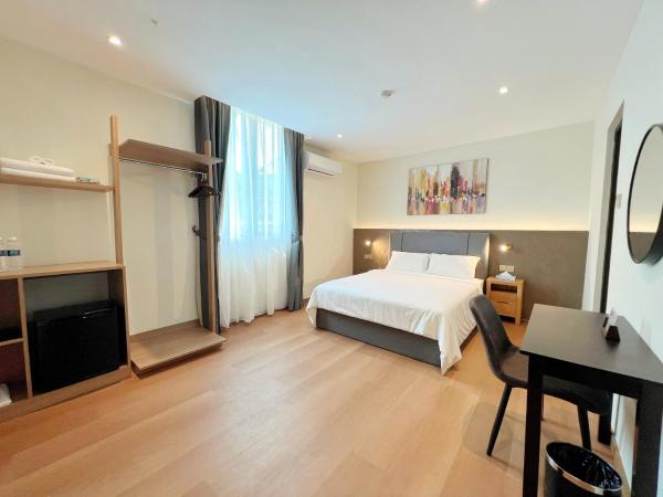 The Borneo Hotel : photo 4 de la chambre chambre lit queen-size deluxe