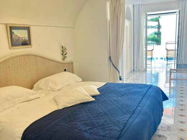 La Vega : photo 2 de la chambre chambre exécutive avec 2 lits queen-size