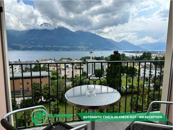 E-Rooms Minusio : photo 3 de la chambre chambre lits jumeaux - vue sur lac