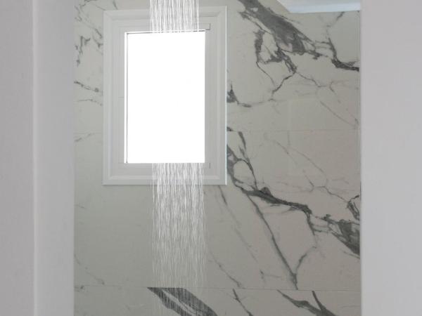 Jensen Luxury Suites : photo 10 de la chambre suite lit king-size avec baignoire spa