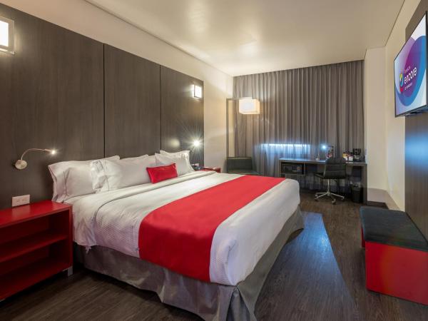 Ramada Encore by Wyndham Queretaro : photo 2 de la chambre chambre lit king-size