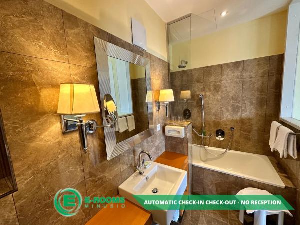 E-Rooms Minusio : photo 4 de la chambre chambre quadruple - vue sur lac