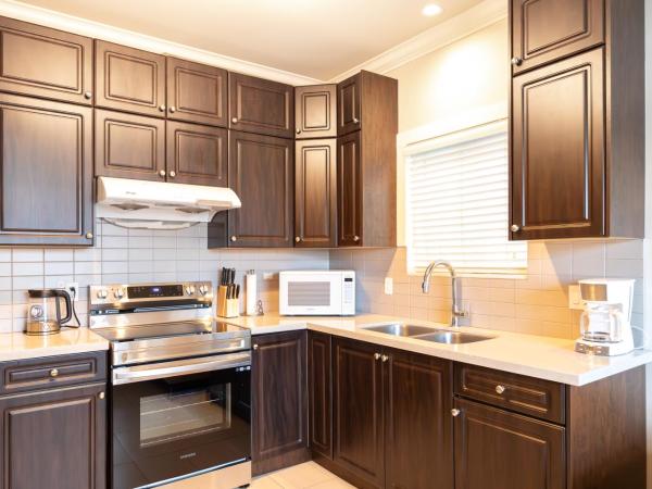 Rare Find Exquisitely New Quiet & Safe Skytrain Home : photo 3 de la chambre suite 2 chambres