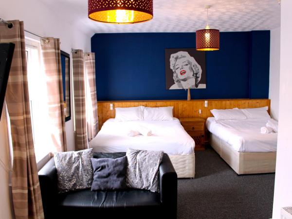 Henson Hotel Pleasure Beach : photo 1 de la chambre chambre familiale