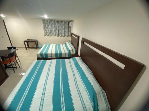 CORDIALITY INN : photo 4 de la chambre chambre deluxe avec 2 lits queen-size