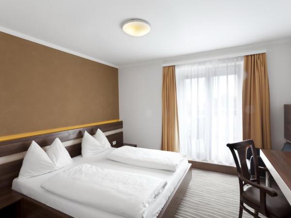 Primus Hotel & Apartments : photo 1 de la chambre appartement 2 chambres