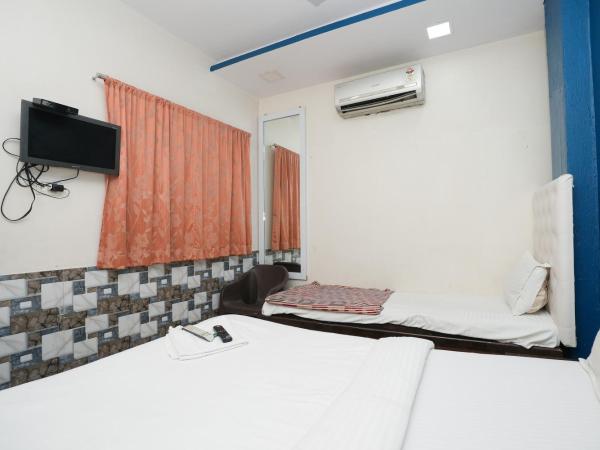 Hotel Om Residency : photo 4 de la chambre chambre familiale deluxe