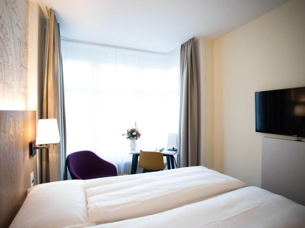 Kreuz Bern Modern City Hotel : photo 1 de la chambre chambre lit queen-size style