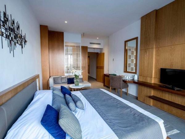 Les Orangers Garden Villas and Bungalows Ultra All inclusive : photo 3 de la chambre chambre double ou lits jumeaux avec balcon