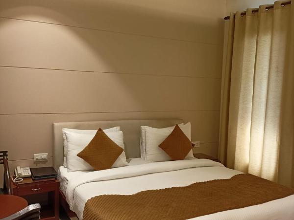 Cosy Grand, Near Chanakyapuri, Embassy Area : photo 9 de la chambre chambre double ou lits jumeaux supérieure
