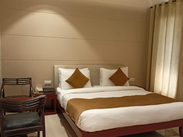 Cosy Grand, Near Chanakyapuri, Embassy Area : photo 10 de la chambre chambre double ou lits jumeaux supérieure