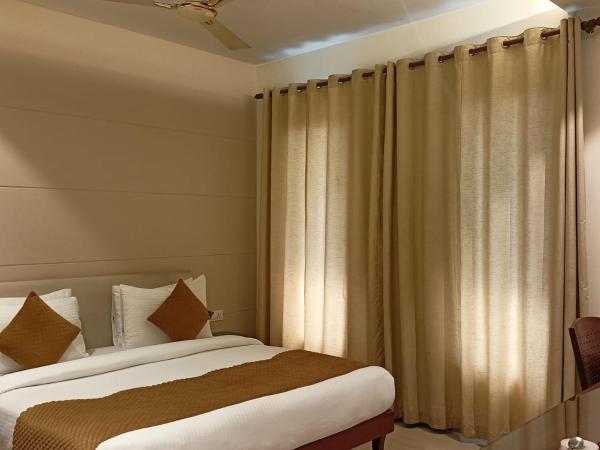 Cosy Grand, Near Chanakyapuri, Embassy Area : photo 8 de la chambre chambre double ou lits jumeaux supérieure
